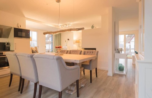 Parow Appartement | Vacation home "Nautilus" with covered loggia and view of Rügen