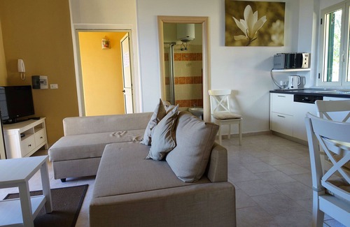 Parghelia Maison | Maison de vacances "Terrazzo A9" avec vue sur mer, piscine partagée & Wi-Fi