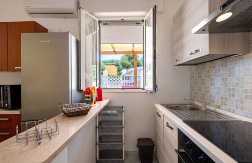 Leporano Marina Maison | Maison de vacances "Villa Minetta" avec piscine privée, terrasse couverte, jardin et Wi-Fi