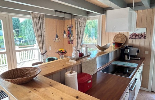 Wendisch Rietz Maison | Maison de vacances directement sur le lac avec une terrasse d'eau - avec sauna et cheminée