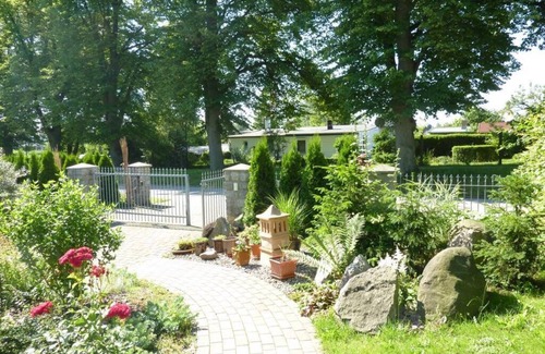 Putnitz Appartement | Des vacances sur un grand jardin dans une nature magnifique près de Bodden