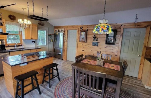 Pittsfield Maison | Vasha is a cozy pet-friendly lake house for relaxing in a secluded location.