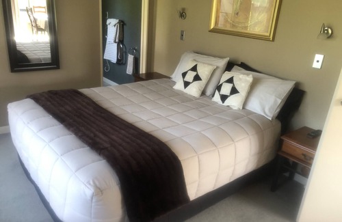 Papamoa Beach Maison | Appartement d'une chambre. Réserve de frontières.