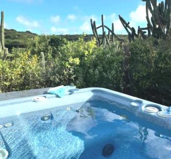 Savaneta Appartement | Very quiet apartment with lots of privacy and a tub on the edge of a national park!