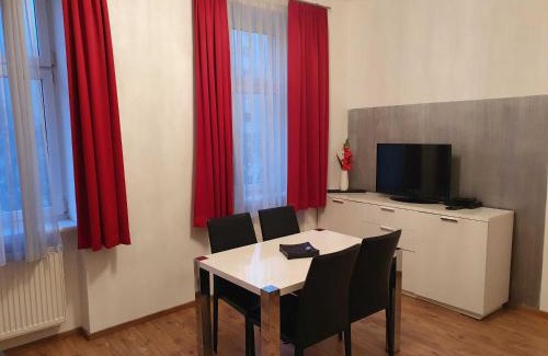 Erdberg Appartement | Vibrant Red Apartment I contactless Check-In