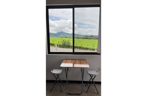 Tierras Morenas Maison | View of the Arenal volcano & lake