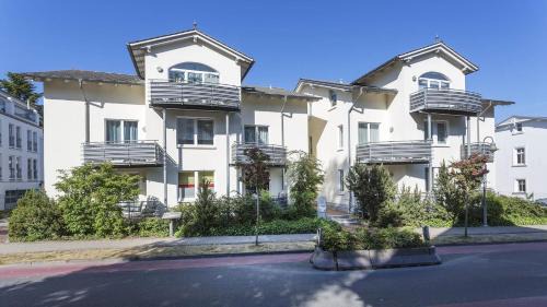 Binz Appartement | Villa a cappella