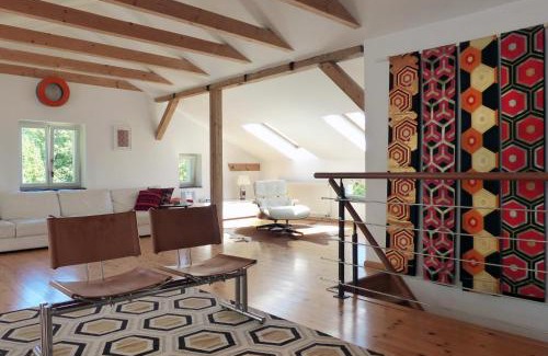 Warnitz Appartement | Villa am Trumpf - Design-Appartements im Naturgarten am See