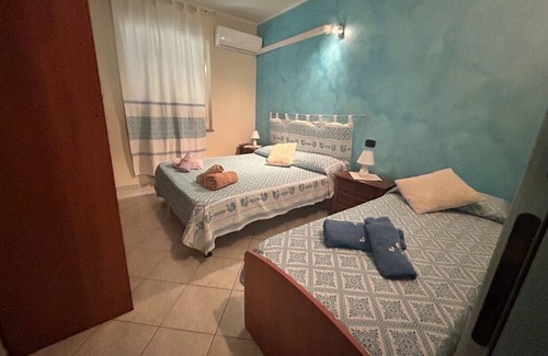 Masainas Lit Et Petit-Déjeuner | Villa Cristina - Triple Room with Shared Bathrooms