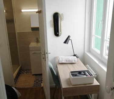 Saint-Charles du Port Appartement | Villa des Roses - Appart T2, 31m2, 1er étage, vue jardin, "Le scandinave"