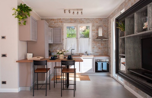 Rezza Villa | Villa 'Due Ulivi' avec terrasse privée, jardin privé et Wi-Fi
