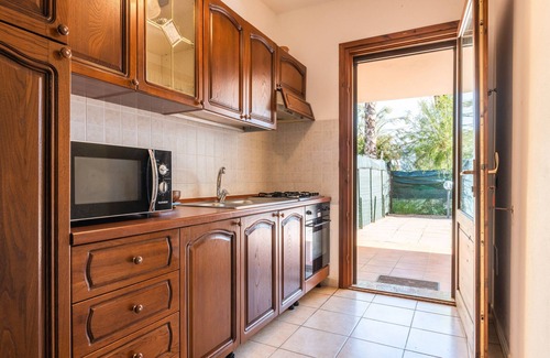 Porto Pino Villa | Villa 'Leo' avec terrasse privée, jardin privé et climatisation