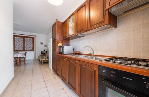 Porto Pino Villa | Villa 'Leo' avec terrasse privée, jardin privé et climatisation