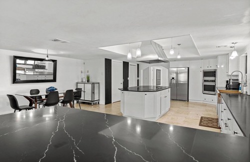 West Little Havana Maison | Villa Maya: 12 BR, 14k sq. ft. estate with pool, pickle ball, bball, disco club!