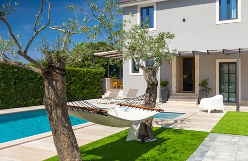 Bibici Villa | Villa Oasi Verde - Family-friendly villa with a private heated pool & a barbecue