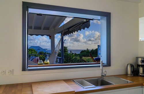 Grand-Bourg Villa | Élégante villa avec piscine, jardin tropical et vue mer, à deux pas des plages,