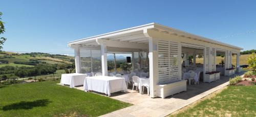 Ripe Lit Et Petit-Déjeuner | villa Resort Tre Castelli
