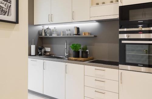 Hohe Dune Appartement | Villa Schmidt - Strandhaus direkt am Meer mit Sauna, Sport und Dünengarten IV
