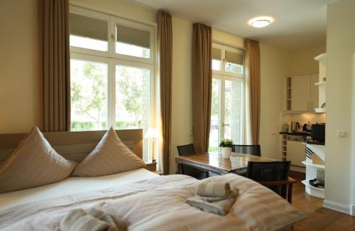 Hohe Dune Appartement | Villa Schmidt - Strandhaus direkt am Meer mit Sauna, Sport und Dünengarten I