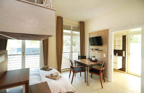 Hohe Dune Appartement | Villa Schmidt - Strandhaus direkt am Meer mit Sauna, Sport und Dünengarten III