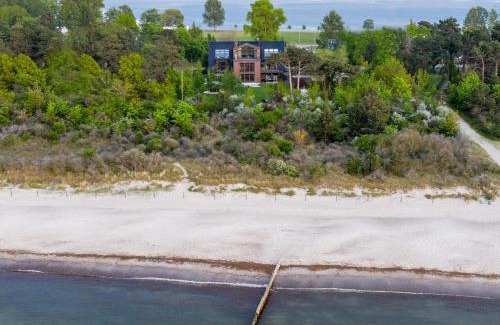 Hohe Dune Appartement | Villa Schmidt - Strandhaus direkt am Meer mit Sauna, Sport und Dünengarten II