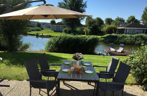 Makkum Maison | Villa Zonnezicht directly at the water, rain-shower, canoe, sauna, 400MBit WLAN