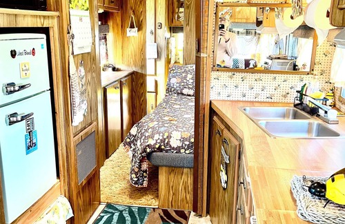 Farmersville Station Maison | Vintage camper with fabulous views of the rolling hills of Western New York