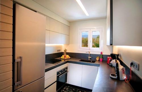 Vouliagmeni Appartement | Vouliagmeni Kavouri Beachfront Apartment