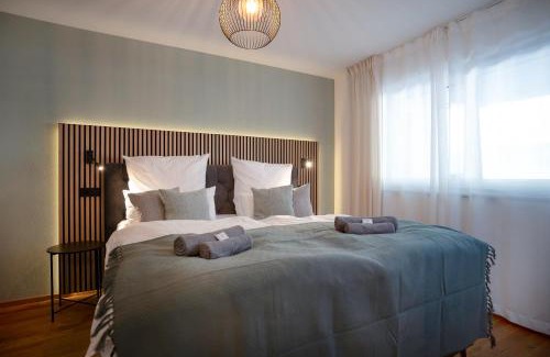 Kempten Appartement | VOYAGE Stadtoase am Fluss I Zentral I freier Parkplatz I Wifi I Netflix I Aufzug