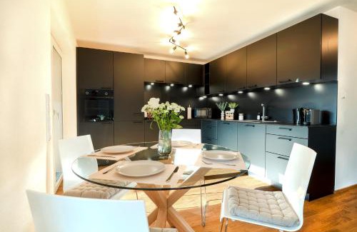 Kempten Appartement | VOYAGE Stadtoase am Fluss I Zentral I freier Parkplatz I Wifi I Netflix I Aufzug