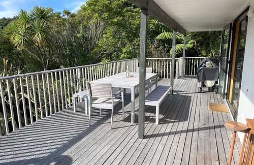Waikawa Bay Maison | Waikawa Bay bach with spectacular harbour views and surrounded by native bush