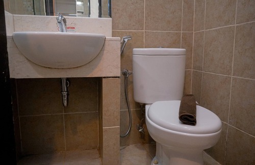 Panunggangan Utara Appartement | Warm and Minimalist Studio (No Kitchen) at Great Western Apartment