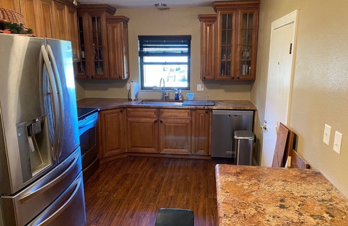 Minneola Maison | Watch Florida sunsets from the covered lakefront dock