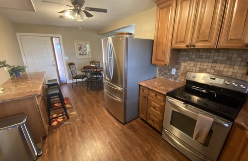 Minneola Maison | Watch Florida sunsets from the covered lakefront dock