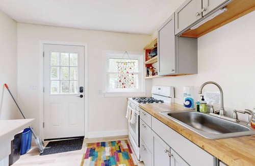 Sebasco Maison | Water view home with scenic balcony, grill, board games, and AC