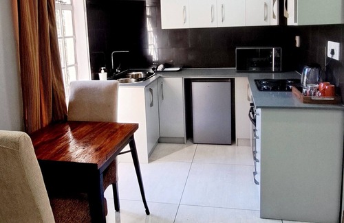 Woodmead Cabine | Waterfall City Guest Lodge - Executive Suite