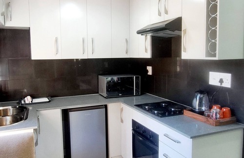 Woodmead Cabine | Waterfall City Guest Lodge - Executive Suite