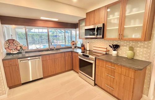Venetian Way Maison | WATERFRONT COCOA BEACH HOME, POOL, KAYAKS, & MANATEES
