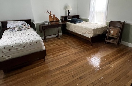 Piney Point Maison | Waterfront cottage with private pier, fireplace, and large yard.