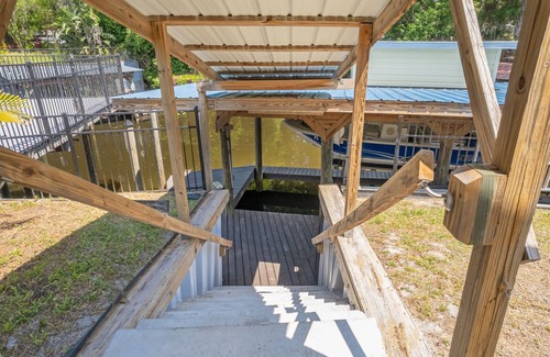 Satsuma Maison | Waterfront home in Satsuma. Two bedrooms each with full bath. Gas grill.