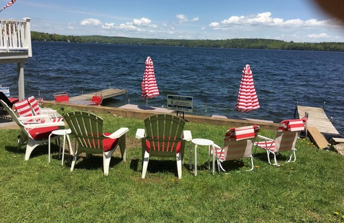 Laconia Maison | WATERFRONT HOME MILLION DOLLAR VIEWS BOAT HOUSE & BOAT SLIPS SITS ONTOP OF WATER