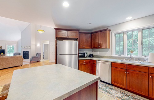Raymond Maison | Waterfront home with a fireplace, grill, deck, washer/dryer, & AC - dog-friendly