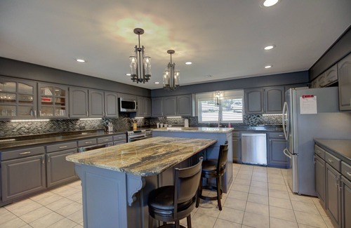 Grove Maison | Waterfront Home with private boat ramp and boat dock.