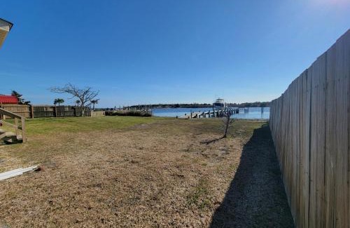 Cedar Point Maison | Waterfront home with Private Dock and swimming area, large fenced backyard