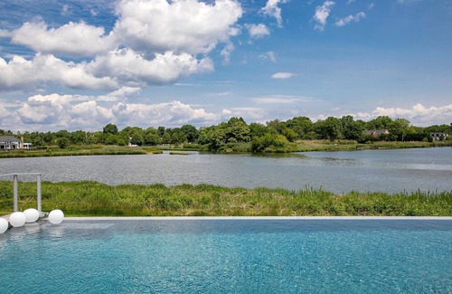 Little Silver Maison | Waterfront, infinity edge pool and 3 miles to the beach!