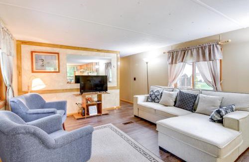 Isle Maison | Waterfront Wahkon Home with Wraparound Deck and Docks