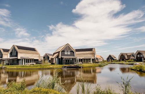 Heeg Maison | Watervilla buitenzijde met Sauna I 8 personen - Boutique Parc Pharshoeke