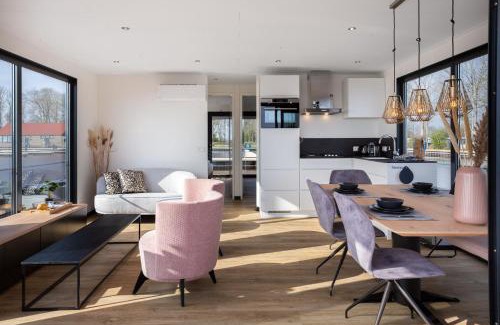 Offingawier Appartement | Welcome in - Houseboat 'de Valreep' met tuin - Sneek - Offingawier