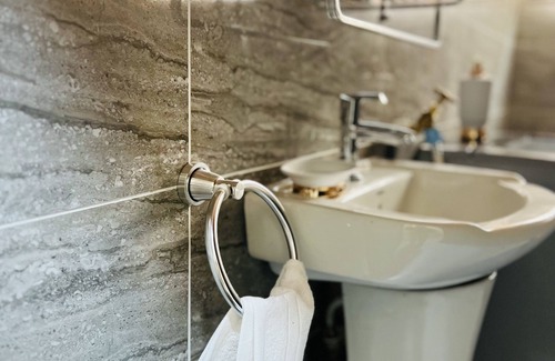 Osu Appartement | Welcome to our cozy two-bedroom house with an inviting atmosphere you will love