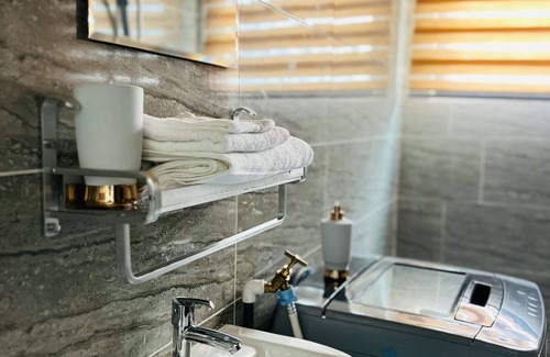 Osu Appartement | Welcome to our cozy two-bedroom house with an inviting atmosphere you will love